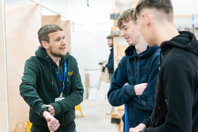 Pictured: Plastering students mastering new skills at St Vincent College in Gosport
